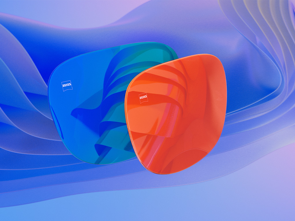 3D CGI 插圖：兩款具有藍色和橙色鏡面塗層的太陽眼鏡鏡片。